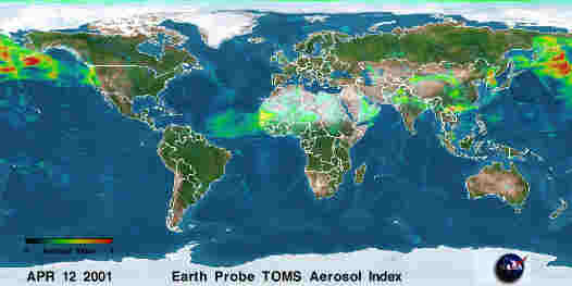 A satellite image of the passage of a cloud of dust across the Pacific Ocean to North America. This dust cloud was raised by a storm in Asia in April 2001. Also shown is a dust cloud from northern Africa traveling west over the Atlantic Ocean.