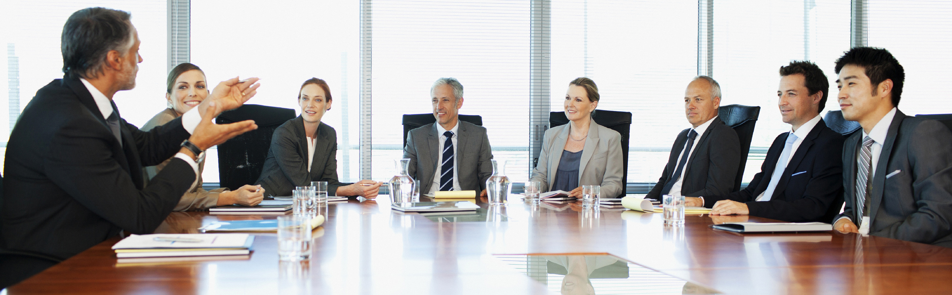 Colleagues in discussion around a table