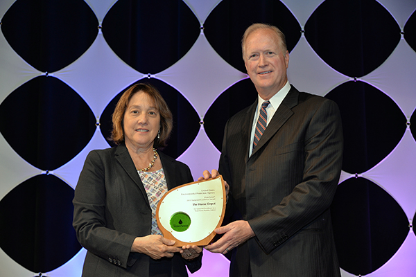 Ron Jarvis accepts Sustained Excellence Award for The Home Depot.