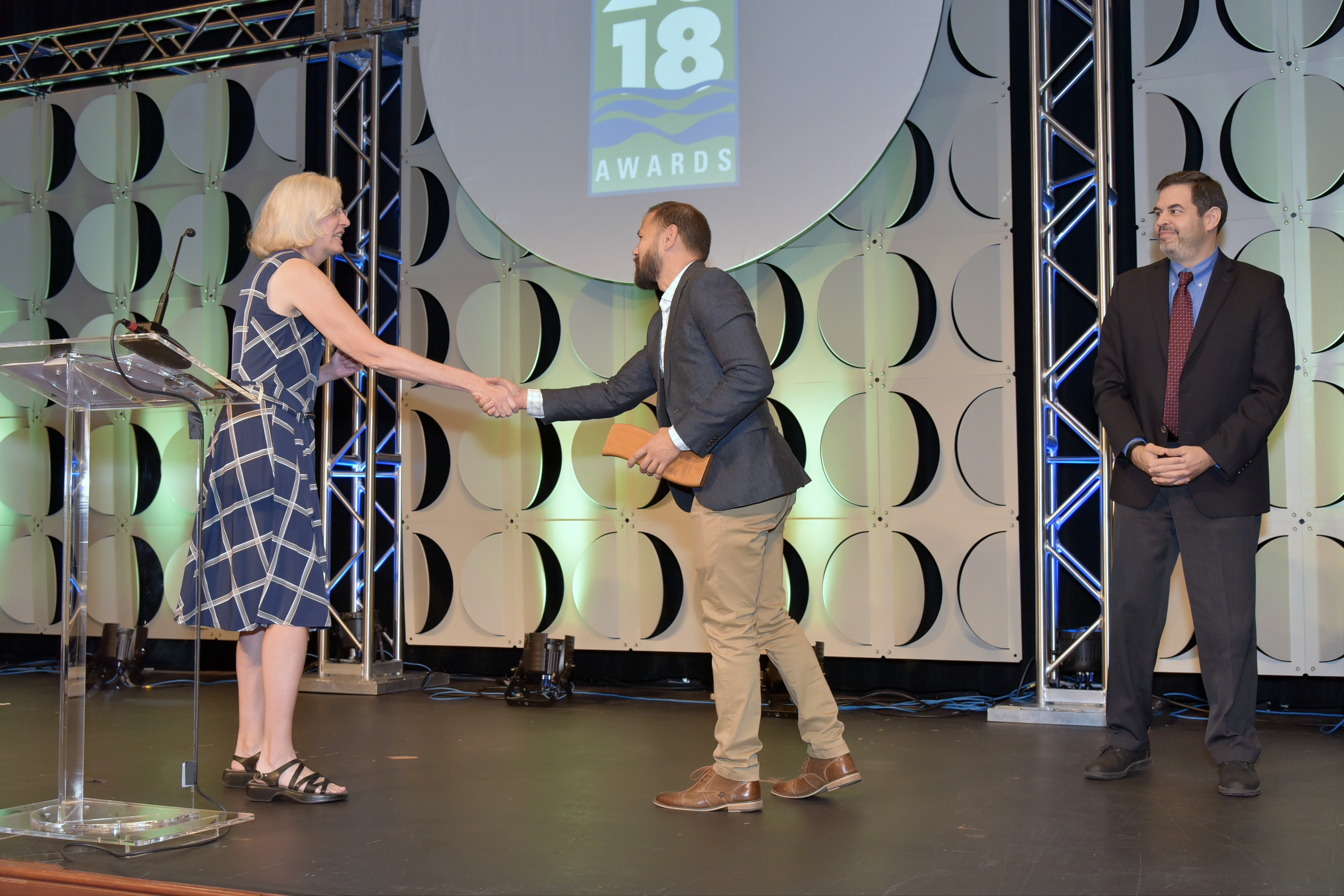 James Lim accepts Excellence in Education and Outreach Award for City of Durham Water Management.