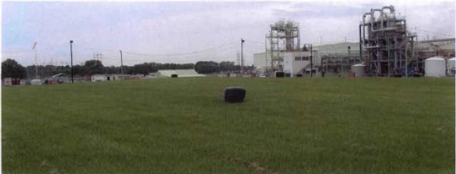 The former burn pit area, with the Westlake Chemical Co. building in the background