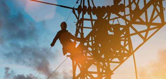 Person climbing a power substation