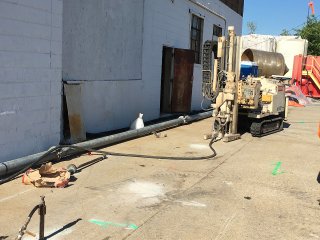 ReDox Tech injecting slurry just north of the site building as part of the pilot scale treatment