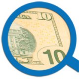 A $10 bill in a magnifying glass. 