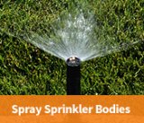 Sprinkler watering grass.