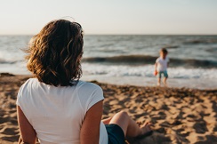 woman and young child at beach