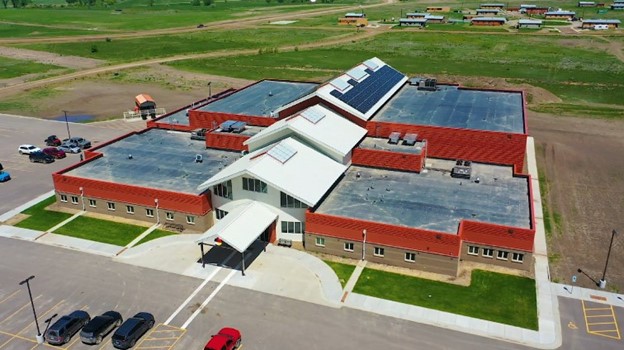 Image of a wellness center and surrounding open space. 