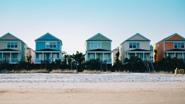 Houses along a sandy beach