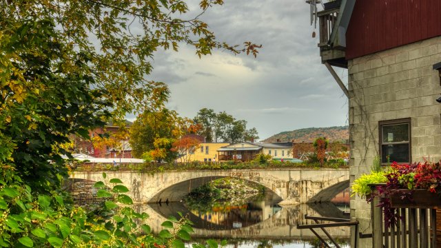 View of river and town of Shelbourne Falls, MA