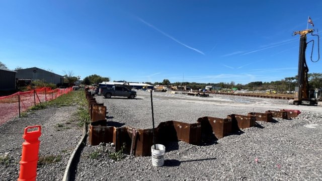 Sheet pilings jutting up from the ground - these are yet to be removed.