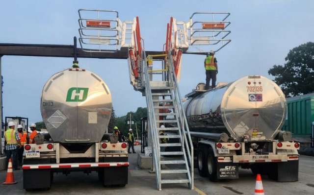 Two tankers are simultaneously loaded with liquid waste