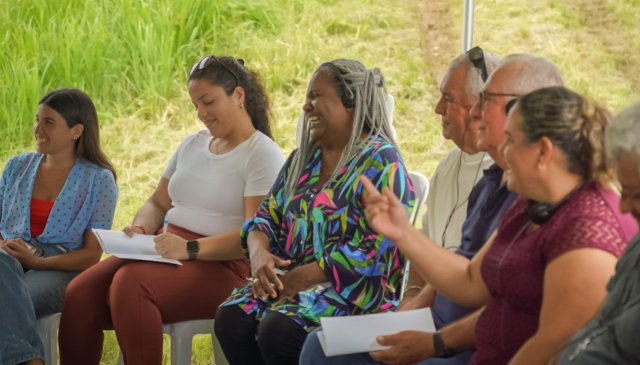 Community members participate in a public hearing.