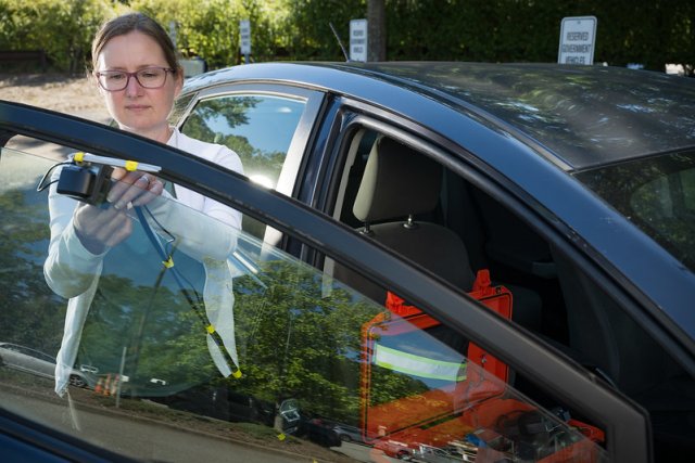 EPA researcher Amara Holder photographed in the field doing research