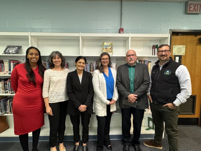 Group photo of grantees smiling.