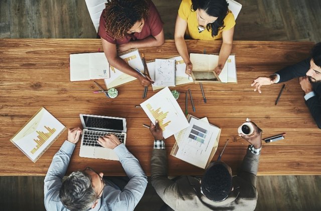 Stakeholders sitting around a table