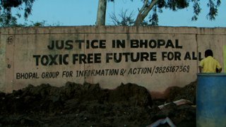 "Justice in Bhopal, Toxic Free Future For All" painted on a concrete wall