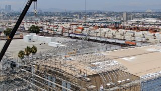 Placement of a roof truss for the Full Enclosure Unit.