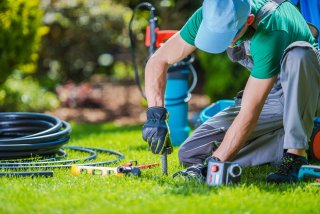 Landscape professional working on a yard.