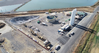 The figure is a photo of the lime softening facility used to treat the reuse water. 